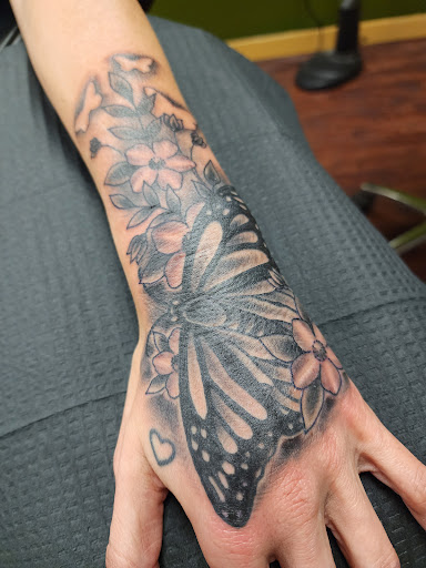 Explore family birthstone tattoo ideas, creative tattoo ideas in Powell, available at Against All Odds Tattoos and Piercings