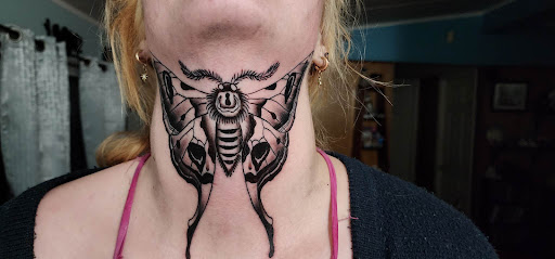 Explore smile tattoo ideas, creative tattoo ideas in Boise, available at Ikon Tattoo and Body Piercing