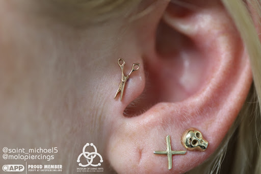 Explore simple elephant tattoo ideas, creative tattoo ideas in Charleston, available at MOLA Piercing and Fine Jewelry