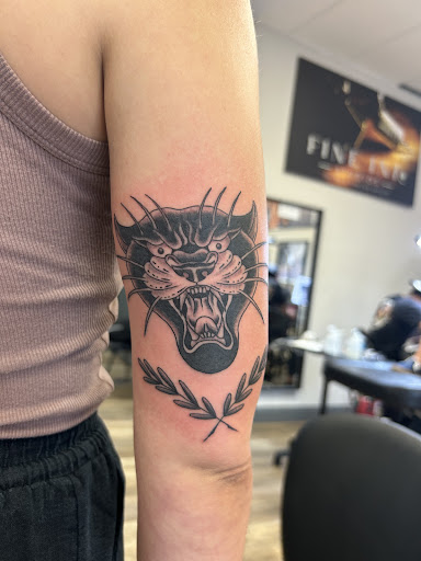 Explore tattoo ideas to cover up a name, creative tattoo ideas in Oviedo, available at Fine Ink Studios Tattoos