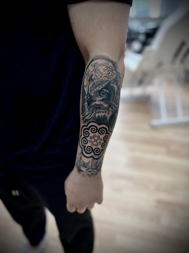 Explore tattoo ideas for behind ear, creative tattoo ideas in Menomonie, available at Blue Dragon Tattoo