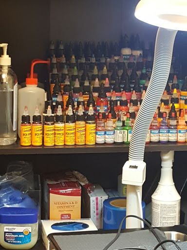 Explore emerald tattoo ideas, creative tattoo ideas in Glendale, available at Ritual Addictions Tattoo and Piercing