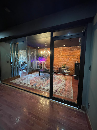 Explore cover up tattoo ideas on thigh, creative tattoo ideas in Washington, available at Trilogy Atelier - DC Tattoo Shop Piercing Studio