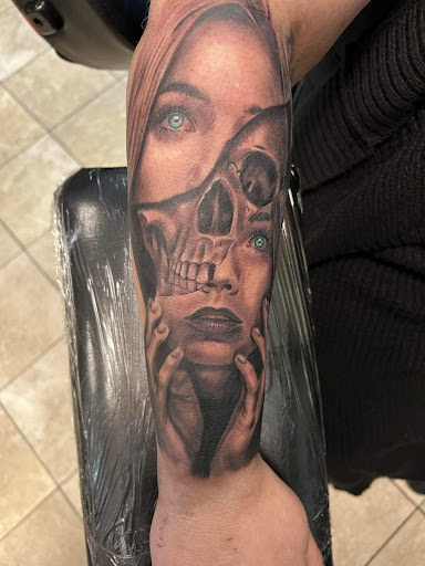 Explore banksy tattoo ideas, creative tattoo ideas in Baraboo, available at Gold Leaf Tattoo Collective and Art Gallery