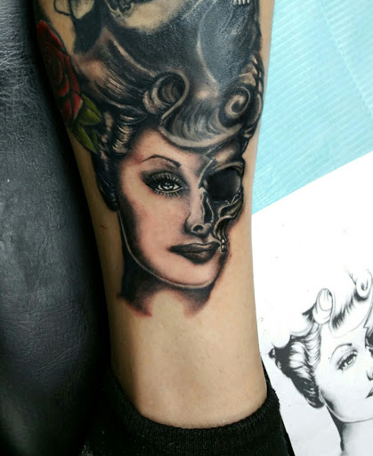 Explore atom tattoo ideas, creative tattoo ideas in Beverly Hills, available at R-N-R Custom Tattoos