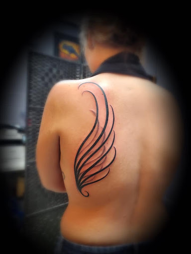 Explore color tattoo ideas, creative tattoo ideas in Lake, available at Soul Rebel Tattoo