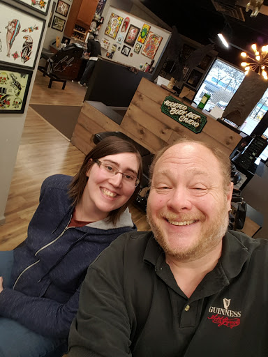 Explore red ink tattoo ideas for guys, creative tattoo ideas in Cleveland, available at Addicted Body Arts Studio