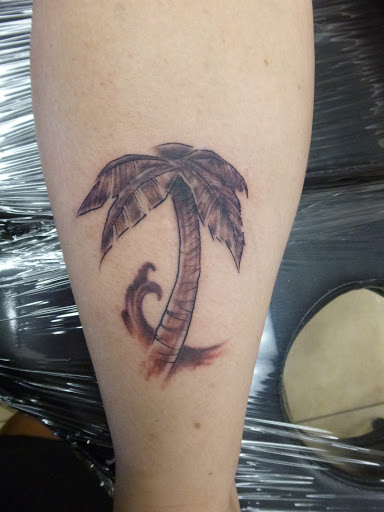 Tattoo Shop «magnum opus tattoo company», reviews and photos, 1817 Padre Blvd #4, South Padre Island, TX 78597, USA