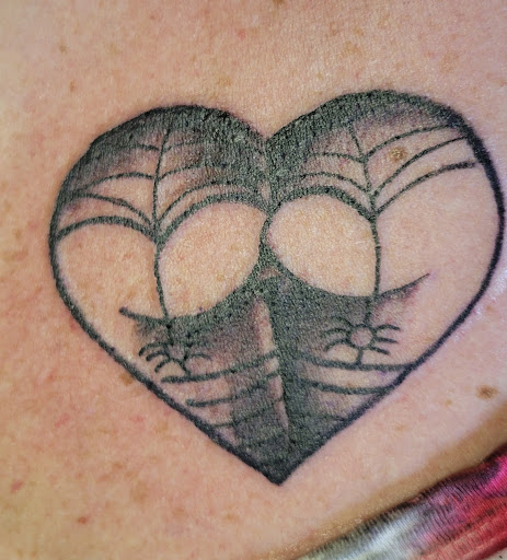 Explore tattoo ideas for shoulder and arm, creative tattoo ideas in Angola, available at Hoodlum Ink