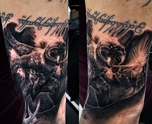 Explore lion and the lamb tattoo ideas, creative tattoo ideas in Kenosha, available at Kenosha Tattoo Company