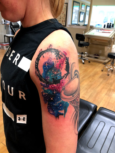 Explore back tattoo ideas for women, creative tattoo ideas in Liberty, available at Dark Lotus Tattoo & Salon