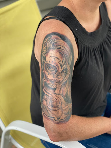 Explore tattoo ideas for top of leg, creative tattoo ideas in Salem, available at 618 INK