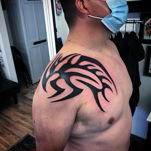 Explore half sleeve tattoo design ideas, creative tattoo ideas in Madera, available at Sea Wolf Tattoo