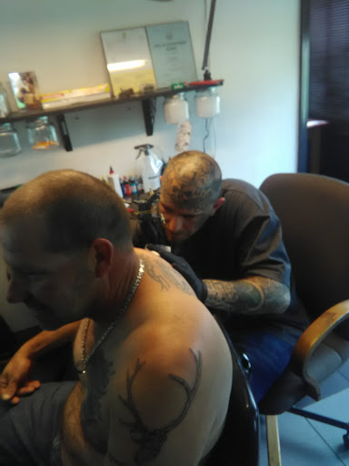 Tattoo Shop «Purgatory Tattoos», reviews and photos, 11001 East 39th St S, Independence, MO 64052, USA