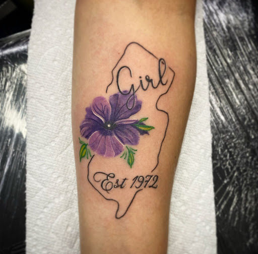 Explore trinidad tattoo ideas, creative tattoo ideas in Fort Myers, available at Loyal 2 The Coil Tattoos & Piercings (Edison Mall Location Entrance F)