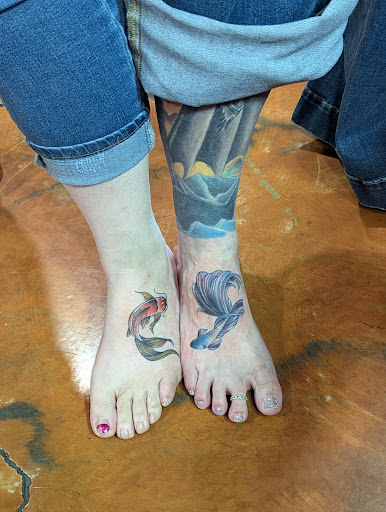 Explore tattoo sleeve ideas flowers, creative tattoo ideas in Coeur D Alene, available at Jojos Tattoo & Body Piercing