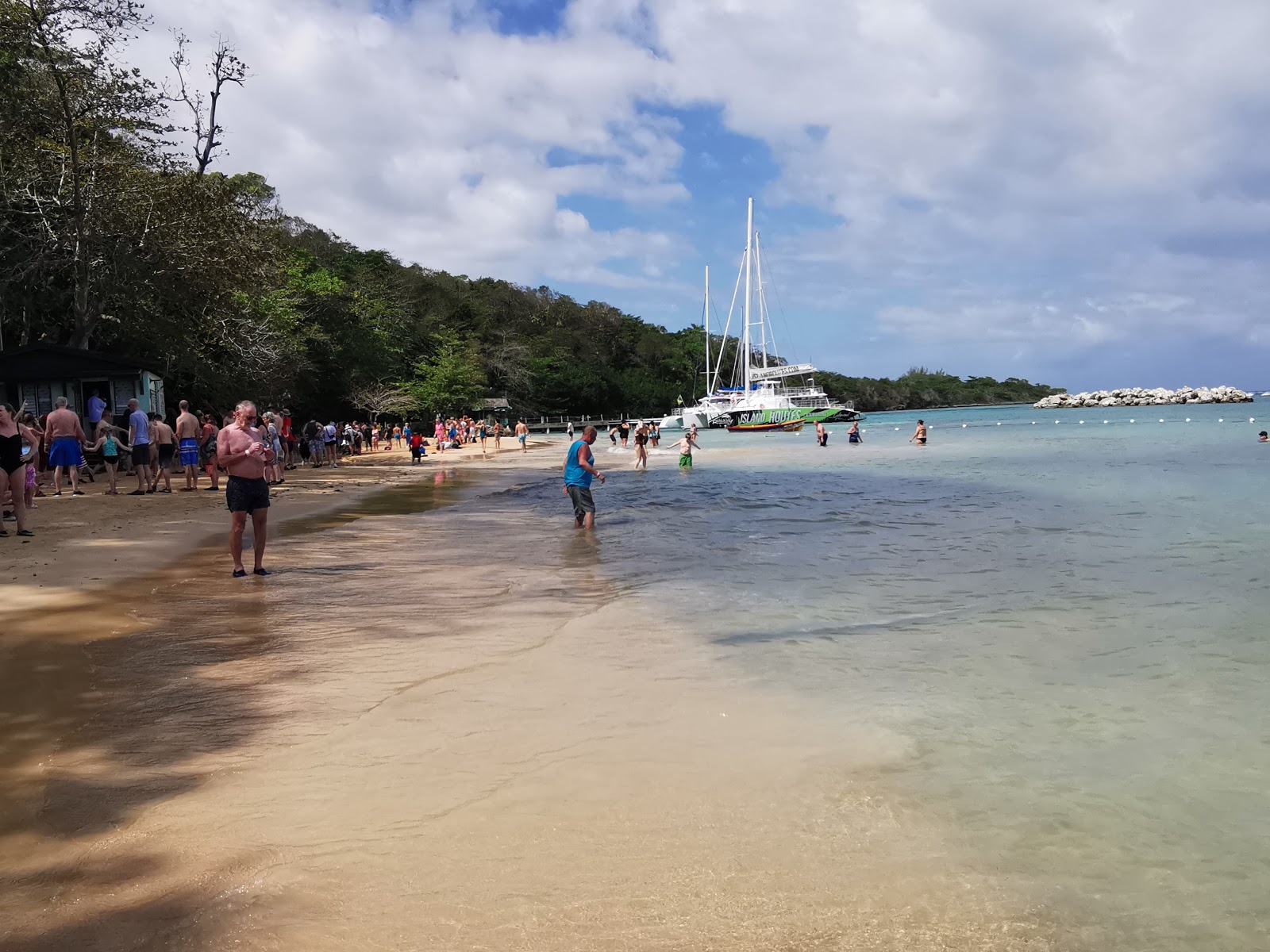 Photo of Dunn’s River Beach surrounded by mountains