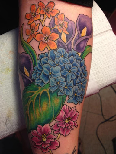 Tattoo Shop «Magnum Tattooing», reviews and photos, 2317 Division Ave S, Grand Rapids, MI 49507, USA