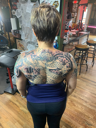 Explore daughter sleeve tattoo ideas, creative tattoo ideas in Lake Villa, available at Eternal Tiger Tattoo