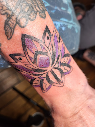 Explore cover up tattoo ideas back, creative tattoo ideas in Fredonia, available at True Blue Tattoo