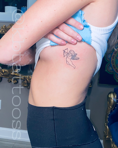 Explore dark skin male black skin tattoo ideas, creative tattoo ideas in King Of Prussia, available at Get Ink Gallery