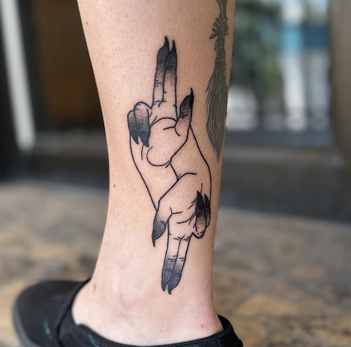 Explore male wedding ring tattoo ideas, creative tattoo ideas in Fort Myers, available at Loyal 2 The Coil Tattoos & Piercings (Edison Mall Location Entrance F)