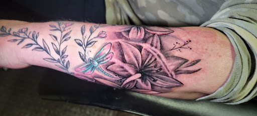 Explore 2000 tattoo ideas, creative tattoo ideas in Angola, available at Hoodlum Ink