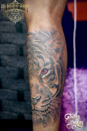 Explore rave tattoo ideas, creative tattoo ideas in Montgomery, available at A1 Body Art Tattoo Parlor