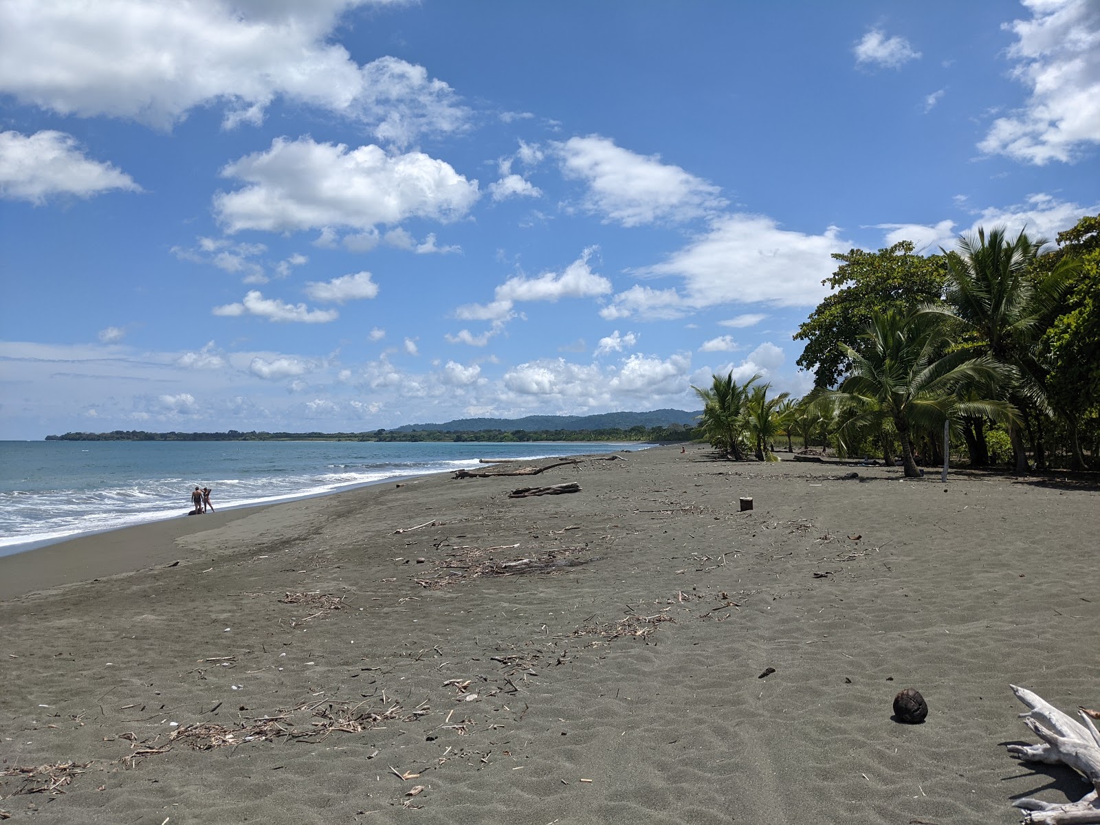 Foto av Playa Platanares med turkosa vatten yta