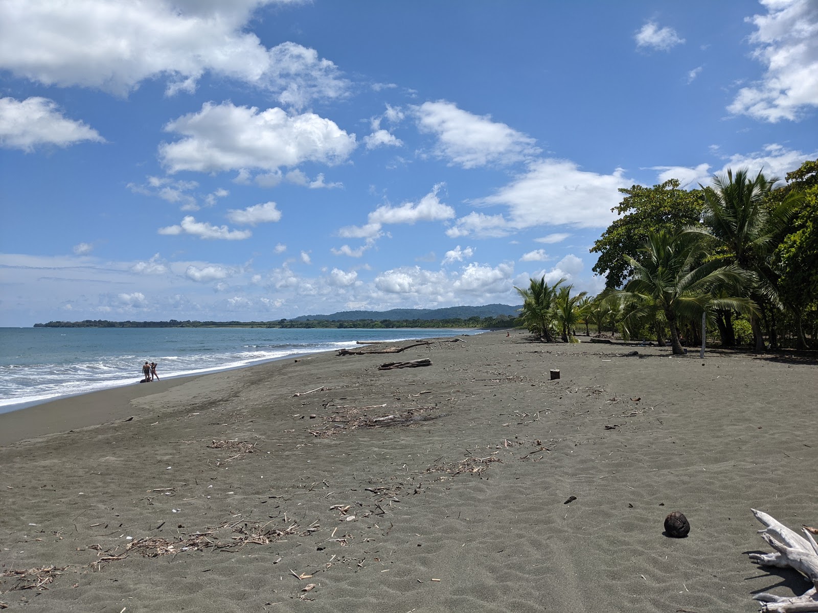 Foto van Playa Platanares met recht en lang