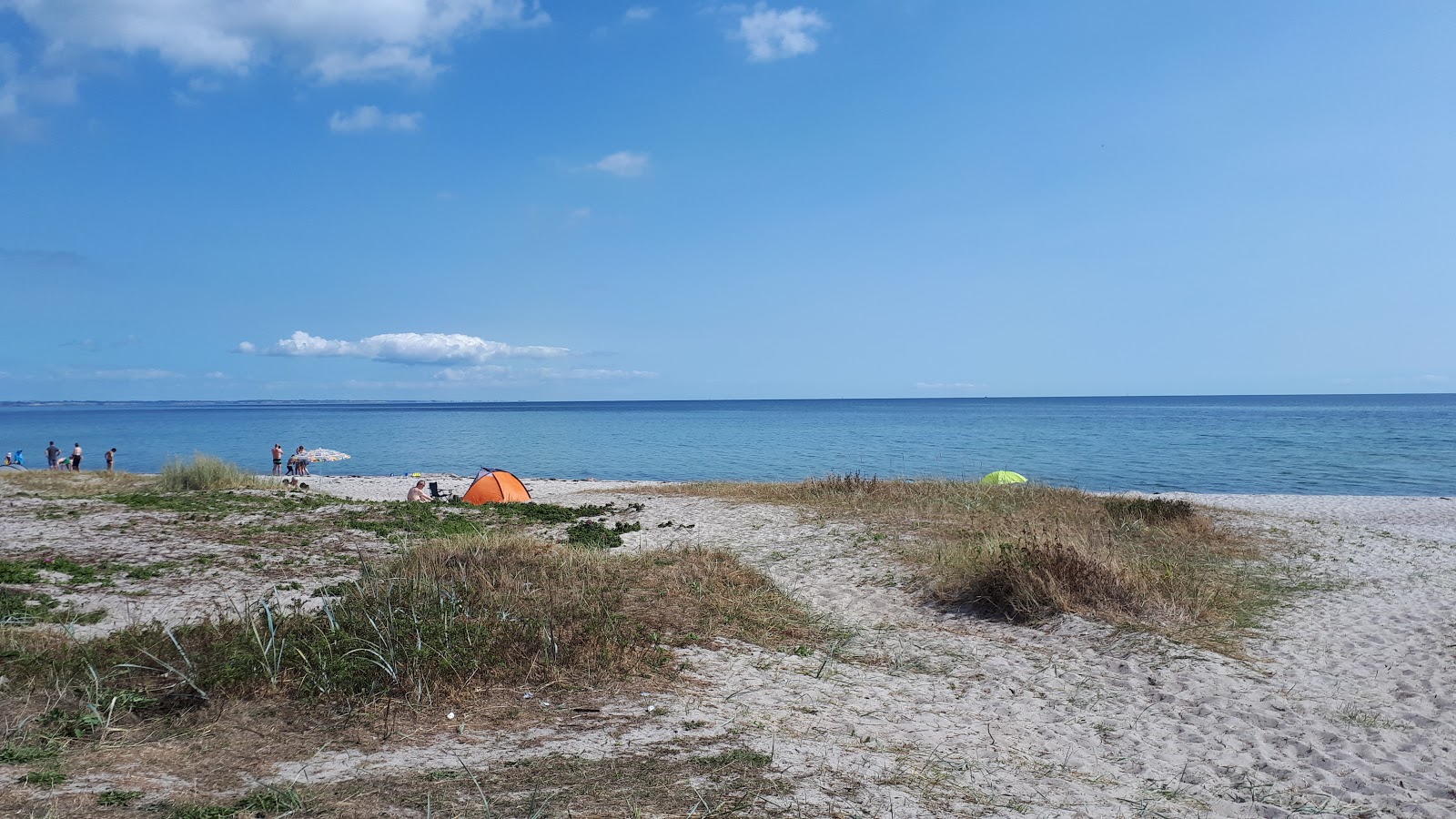 Drejby Beach的照片 带有碧绿色纯水表面