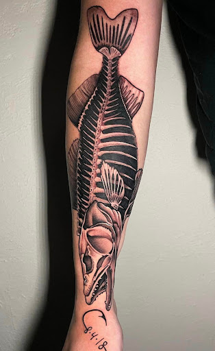 Explore manly tattoo ideas, creative tattoo ideas in Fulton, available at The Kings Head Tattoo Company