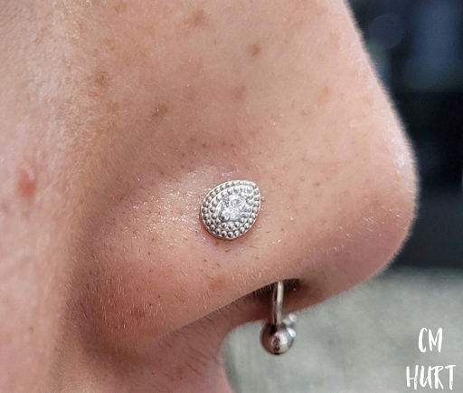 Explore number 7 tattoo ideas, creative tattoo ideas in Garden Grove, available at CM Hurt Piercing & Jewelry