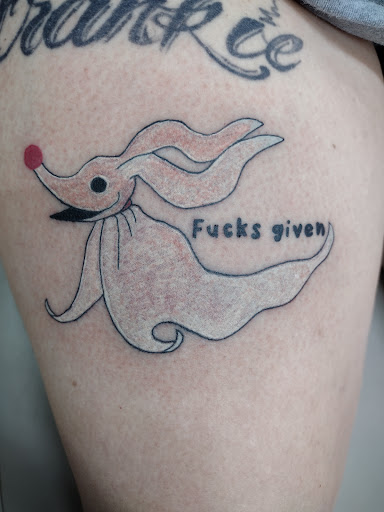 Explore bear paw tattoo ideas, creative tattoo ideas in Benton, available at Spectrum Tattoo