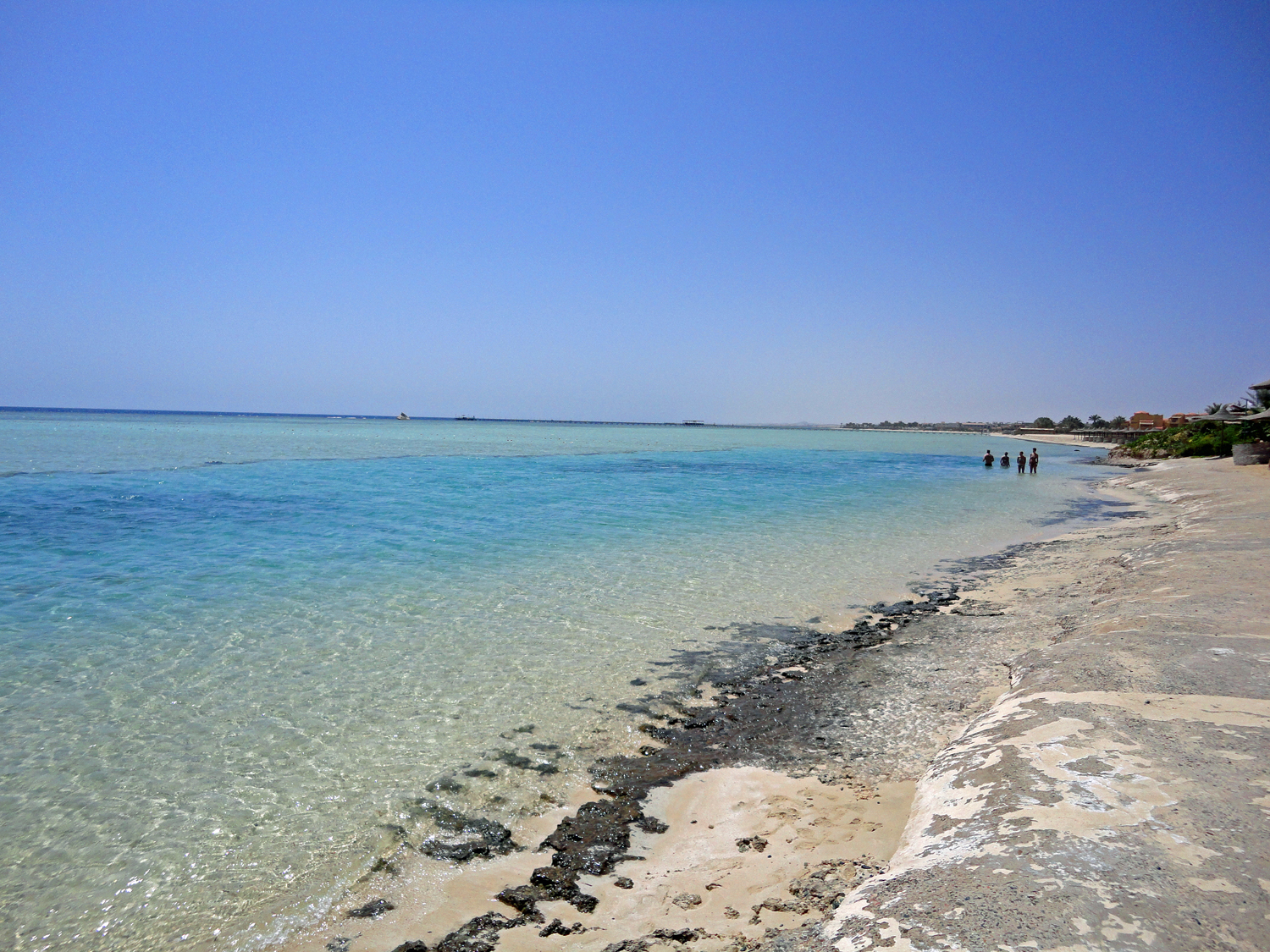 Fotografie cu Blue Reef Resort cu o suprafață de nisip strălucitor