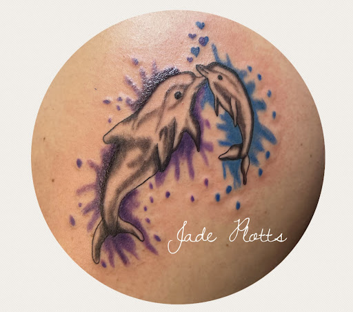 Find small wolf tattoo ideas for your next unique tattoo in Lewisburg at Jolie Femme Permanent Makeup & Tiny Tattoos