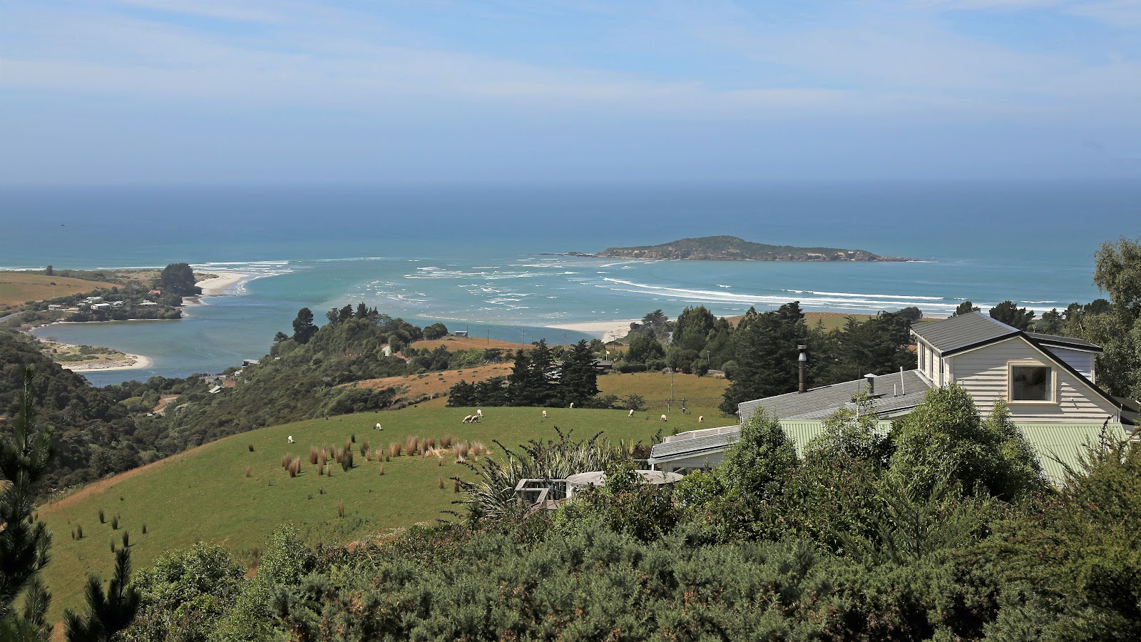 Photo of Taieri Mouth Beach with long straight shore