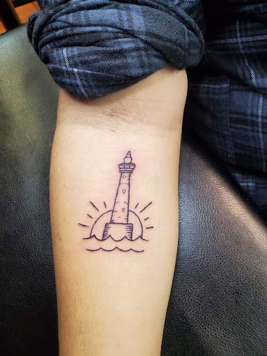 Explore mother and child tattoo ideas, creative tattoo ideas in Cocoa, available at Rorschach Tattoo Shop and Piercing Studio