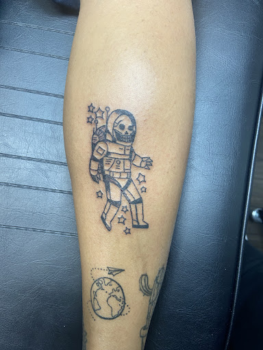 Explore flower arm sleeve tattoo ideas, creative tattoo ideas in Columbus, available at Broken Tarot Tattoo Parlour