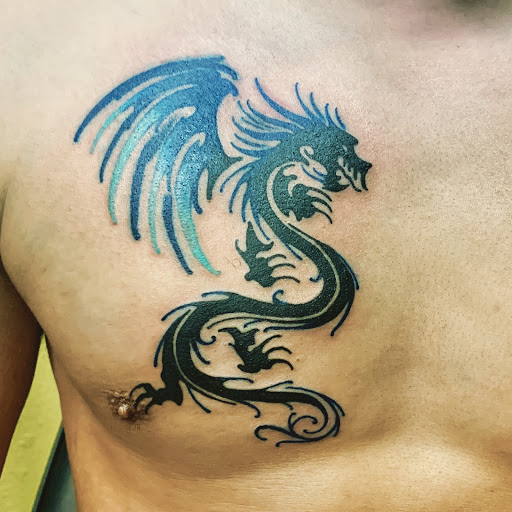 Explore traditional elbow tattoo ideas, creative tattoo ideas in Slatington, available at Freedom Tattoo Company