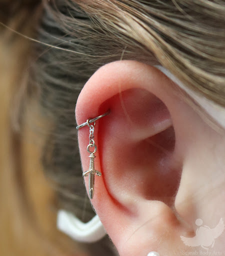 Explore back tattoo ideas for females, creative tattoo ideas in Syracuse, available at Scarab Body Arts