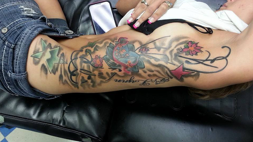 Explore tattoo ideas sun, creative tattoo ideas in Lumberton, available at Wicked Skinsations