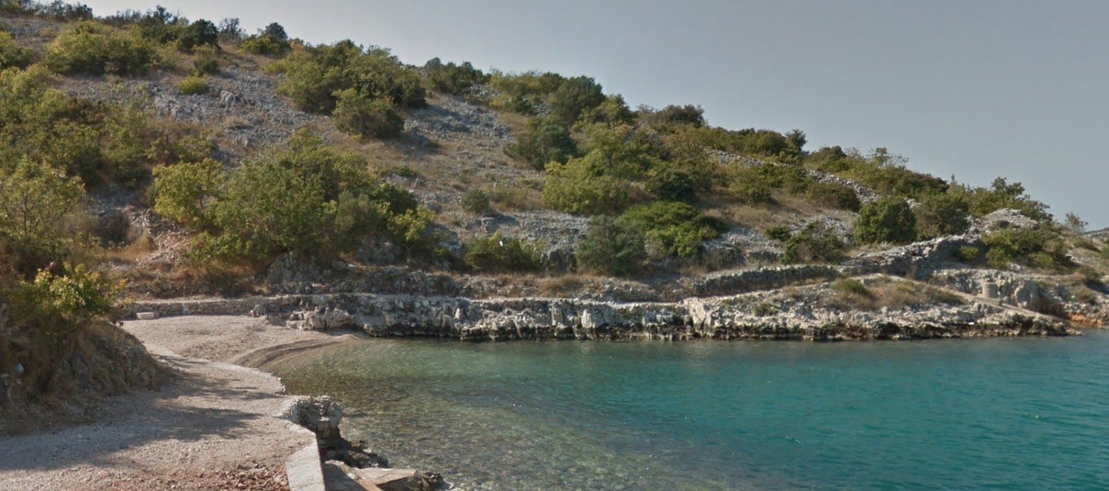 Foto van Zecevo wild beach met kleine baai