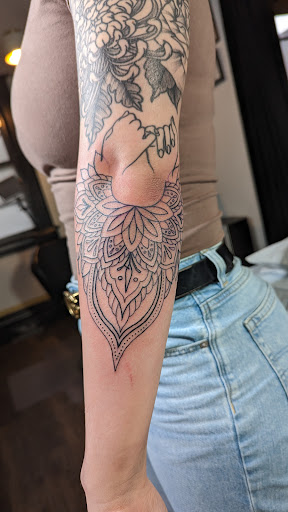 Explore small mermaid tattoo ideas, creative tattoo ideas in Rochester, available at Axe of Kindness Tattoo