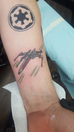 Explore cross tattoo ideas forearm, creative tattoo ideas in Southaven, available at Illusion Ink