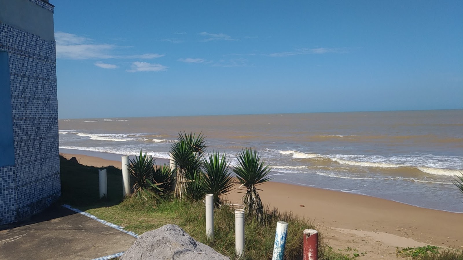 Foto av Manguinhos stranden och bosättningen