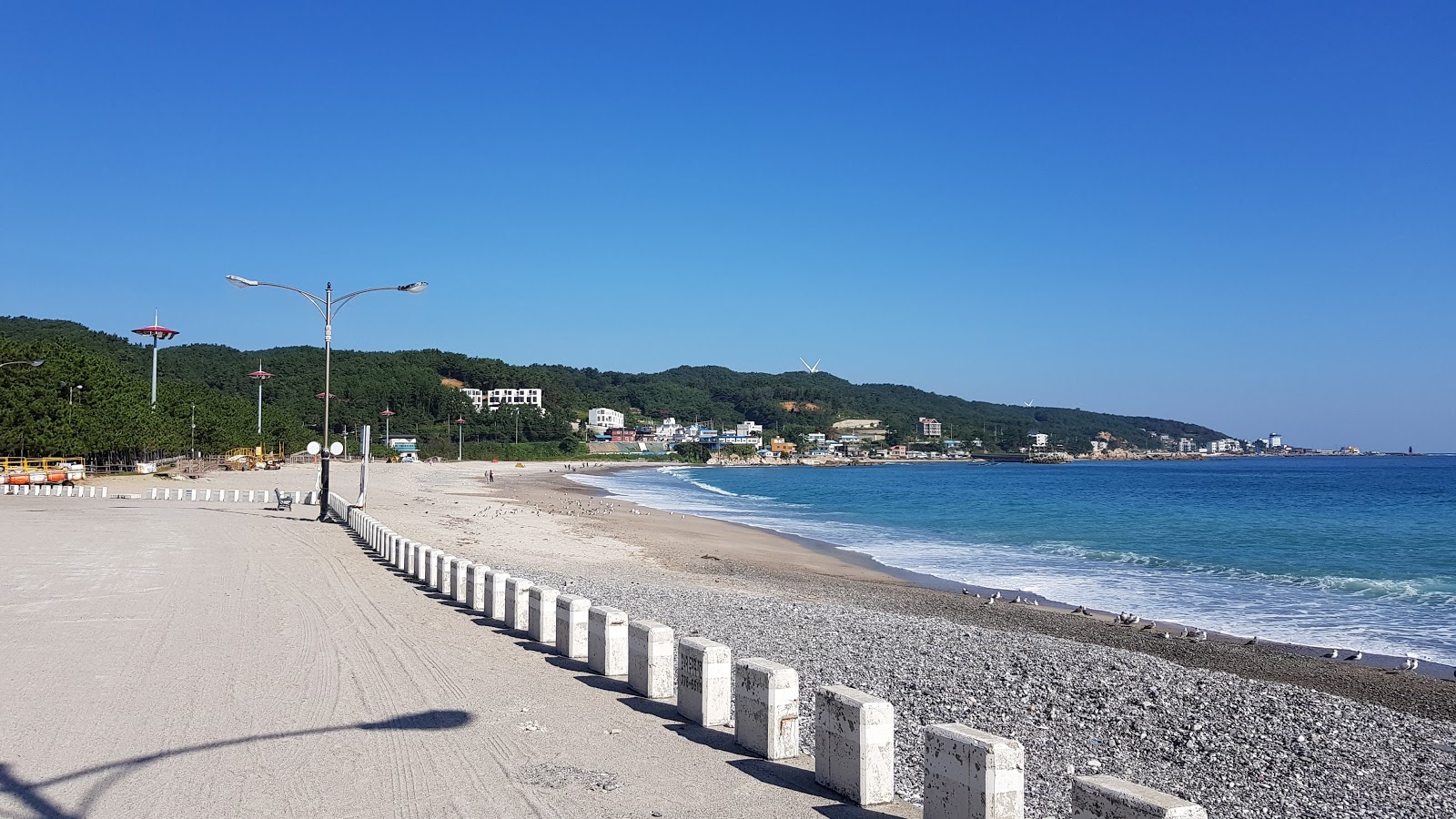 Foto van Oryu Beach met blauw puur water oppervlakte