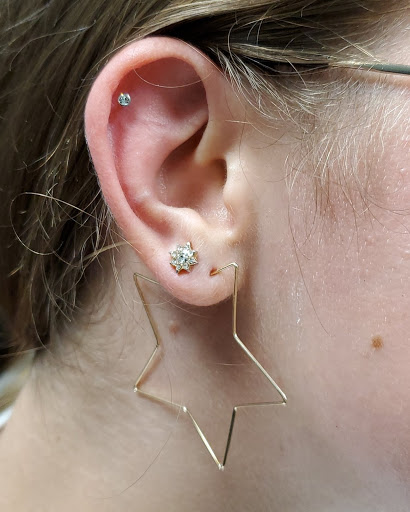 Explore street sign tattoo ideas, creative tattoo ideas in Aurora, available at Ronin Tattoo Studio INC