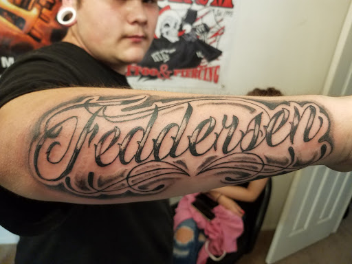 Explore gucci tattoo ideas, creative tattoo ideas in Fort Mohave, available at RedRum Tattoo & Body Piercing Co.