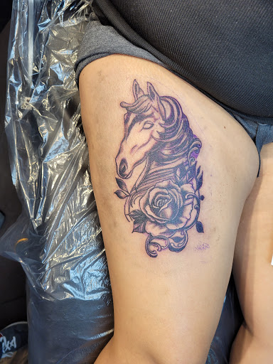 Find under the breast tattoo ideas for your next unique tattoo in Bradenton at Memory Lane Tattoo Co.